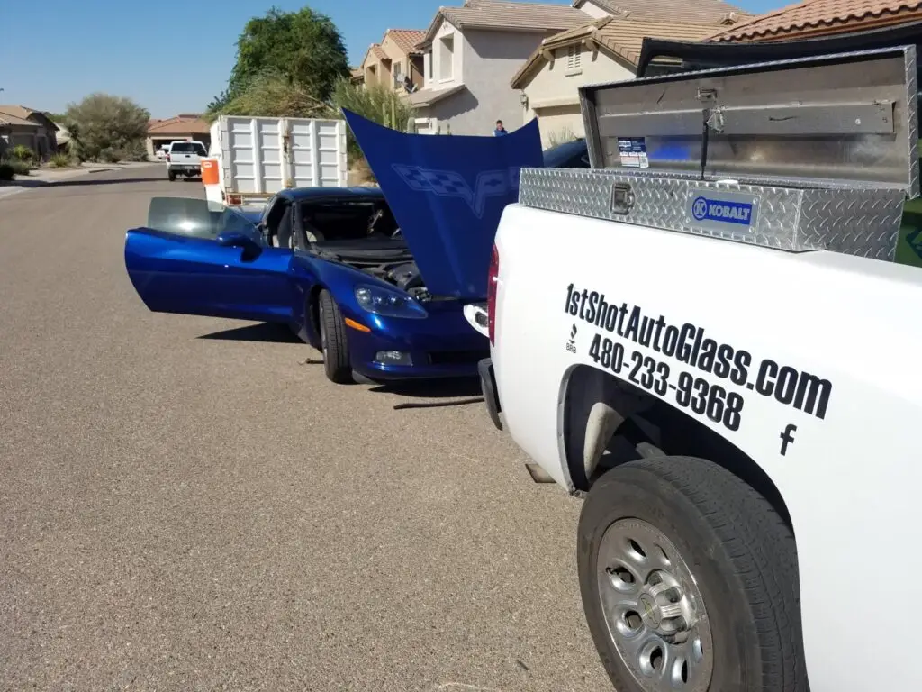 Subaru BRZ windshield replacement in Florence Arizona with 1st Shot Auto Glass logo visible on service truck