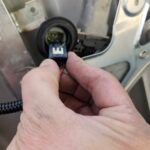 2012 Toyota Tundra Power Sliding Rear Window Replacement 6 Disconnecting regulator wire on 2012 Toyota Tundra power slider