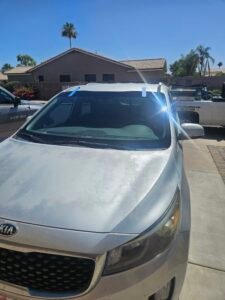 Kia Windshield Replacement | 1st Shot Auto Glass 1 2016 Kia Sedona minivan windshield replacement in Gilbert AZ with condensation sensor and heated wiper system calibration