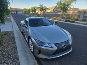 2018 Lexus LC500h Windshield Replacement in Queen Creek 1 Silver 2018 Lexus LC500h with windshield damage before replacement service in Queen Creek, Arizona.