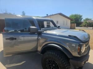 2025 Ford Bronco windshield replacement in Mesa AZ with OEM Carlite glass requiring ADAS calibration