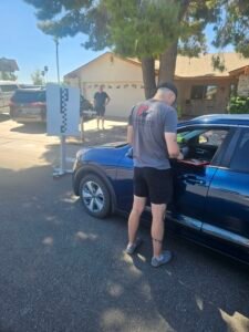 Kia Windshield Replacement | 1st Shot Auto Glass 1 Technician completing ADAS calibration programming on a 2019 Kia Niro Hybrid after windshield replacement.