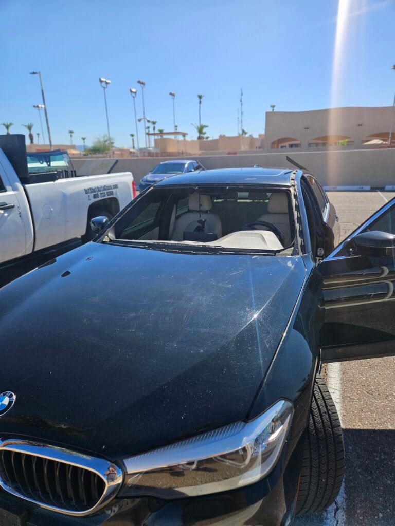 2018 BMW 530i with the windshield removed during mobile windshield replacement service in Mesa, AZ.