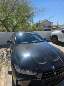 BMW Windshield Replacement | 1st Shot Auto Glass 4 Completed mobile windshield replacement on a 2026 BMW M4 in Phoenix, Arizona after installation and before dynamic ADAS calibration.