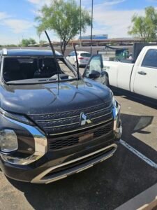 2022 Mitsubishi Outlander with windshield removed during mobile replacement in Tempe, AZ