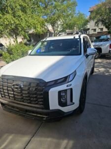 Completed windshield replacement on a white 2024 Hyundai Palisade in Gilbert, Arizona