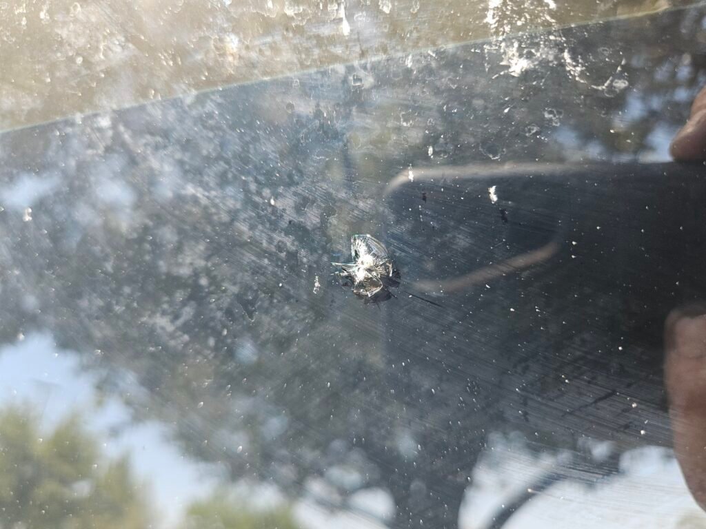 Windshield chip on Jeep Wrangler before mobile repair in Mesa AZ
