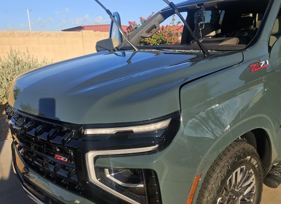 Mobile Windshield Replacement in Mesa, AZ & Greater Phoenix 1 2026 Chevrolet Suburban Z71 in Mesa AZ with windshield removed and wiper arms raised during mobile replacement